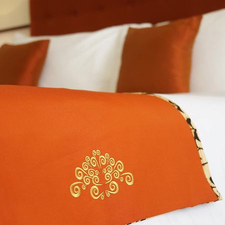 Hotel Ammi Cepu Chambre photo